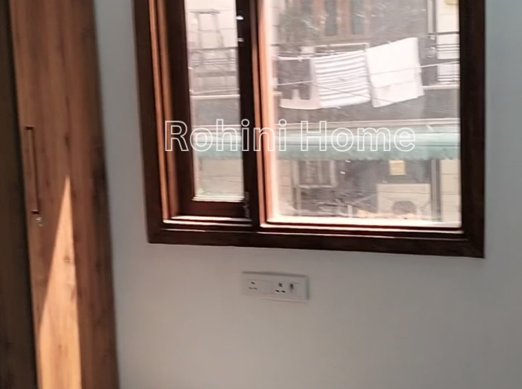 3 BHK floor with lift and parking for sale in Sector 24 Rohini, near Rithala Metro, malls, schools, and parks.